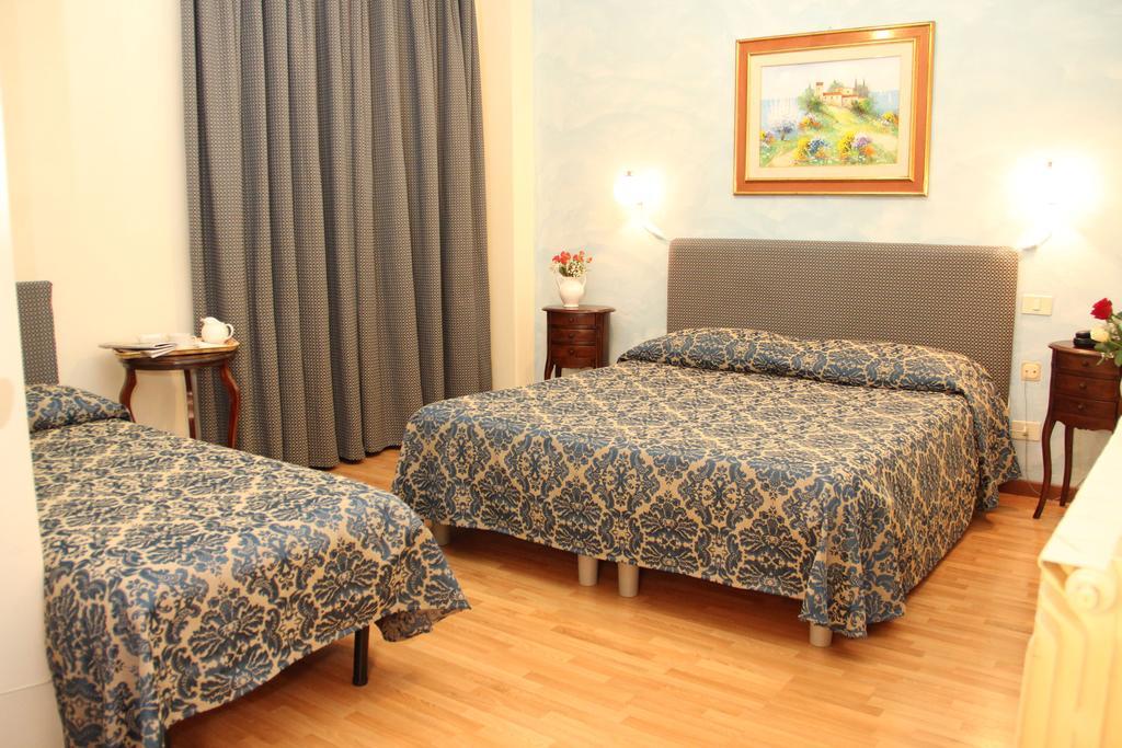 Gemini Camere E Suites Grosseto Pokoj fotografie